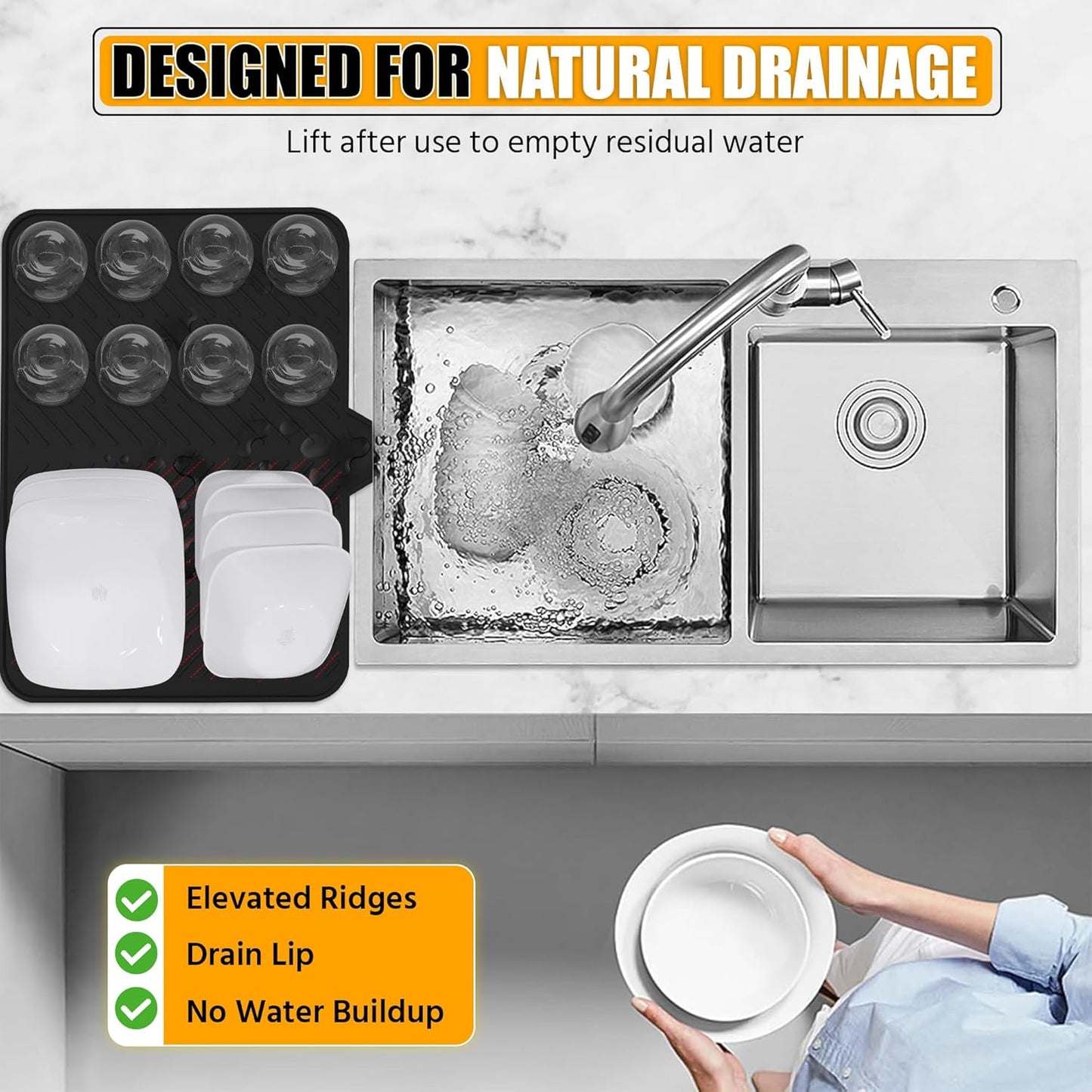 Stainless steel kitchen sink with drainage features and a person holding a bowl.